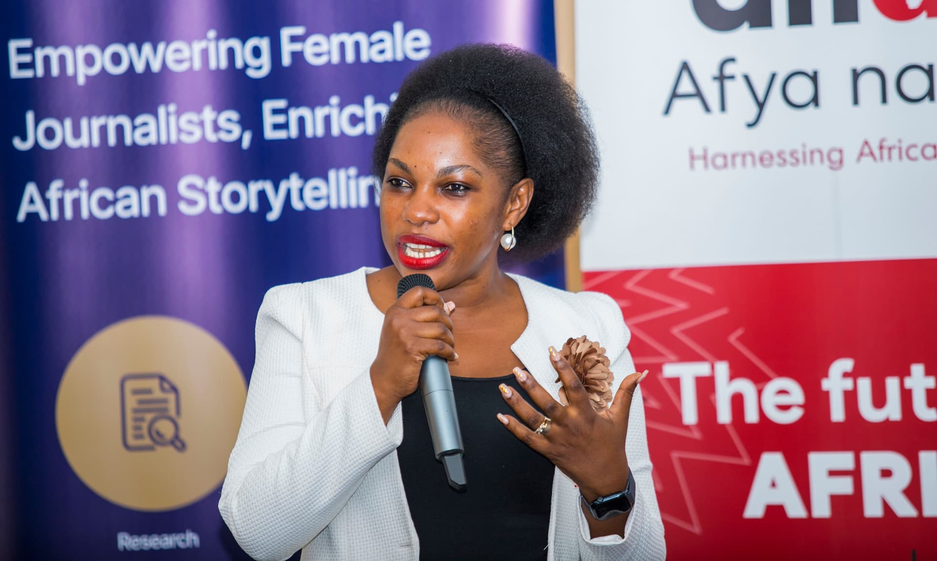 Vivain Serwanjja sharing Sharing information about HRSR at the Ahaki media fellowship 2025